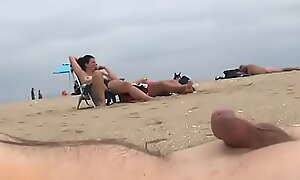 Cumshot on beach to babes