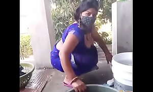 Geeta Bhabhi washing clothes with boobs open